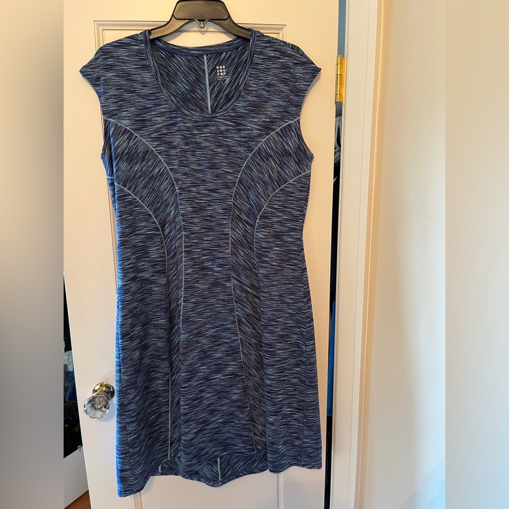 Title Nine stretchy dress with flattering seam details has never been worn.